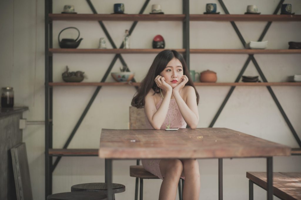 photography-of-a-woman-sitting-on-the-chair-listening-to-765228-scaled