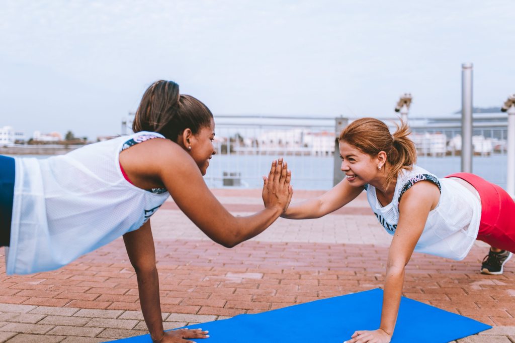 two-woman-doing-exercise-1671217-scaled