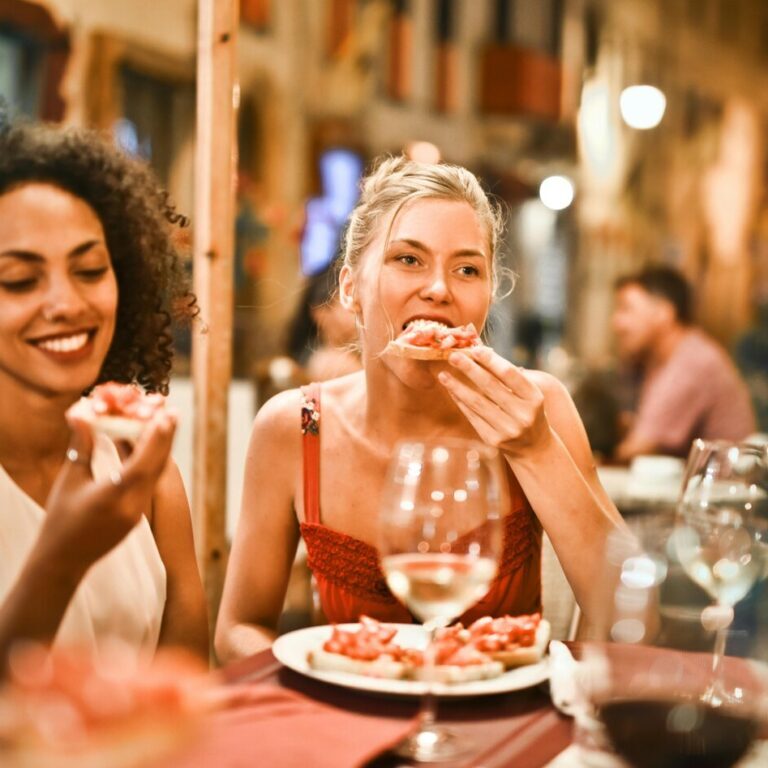 People enjoying eating after eating disorder therapy